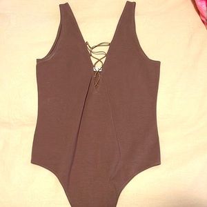 Wilfred Free body suit. Never worn. Size large. Great condition.